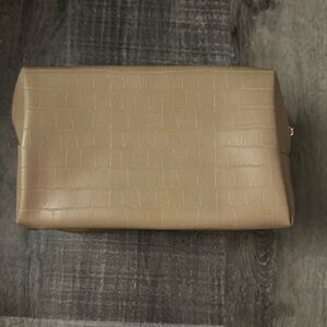 Beige pleather cosmetic bag